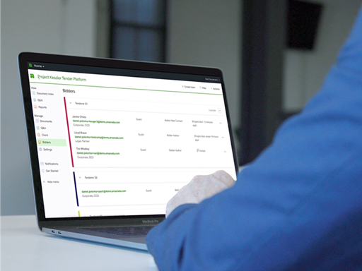 Advisor using the Ansarada platform to manage tenders process. 'UI of bidder Q&A screen displayed on laptop'