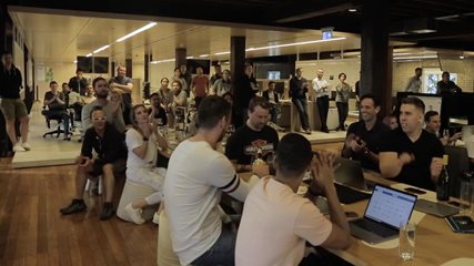 Team gathered around the table